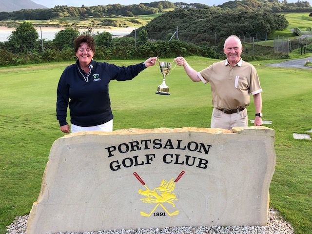 This image has an empty alt attribute; its file name is Society-Captain-Ms-Deirdre-O-Toole-presents-Tommy-Greally-with-his-trophy-as-Donegal-ETB-Golf-Society-Golfer-of-the-Year.jpg